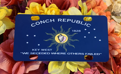 Mini license plate picture showing the Conch Republic Flag design with "We seceded where others failed", "1982", "CONCH REPUBLIC".
