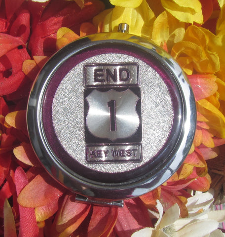 Compact Mirror picture showing a silver design of the US 1 sign "End" and "Key West".