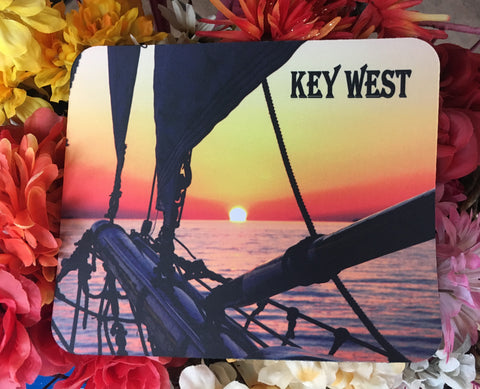 Mouse Pad showing a beautiful sunset picture taken at the bow of a sailboat.