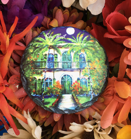Slate Coaster round picture showing a painting of the Hemingway House with "Key West" (white letters).
