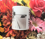 Side view mug showing part of the same front view picture and "KEY WEST" written vertically.