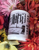 Side view mug showing part of the same picture as described front view plus vertical "KEY WEST".