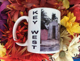 Side view mug showing part of the same picture as described front view plus vertical "KEY WEST" and mug handle.