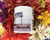 Side view mug showing part of the same picture as described front view plus vertical "KEY WEST".