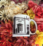 Side view mug showing a mid 20th century picture of Sloppy Joe's Bar and the mug handle.