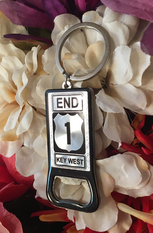 Bottle opener key chain showing a rectangular design of the End US 1 Key West sign.