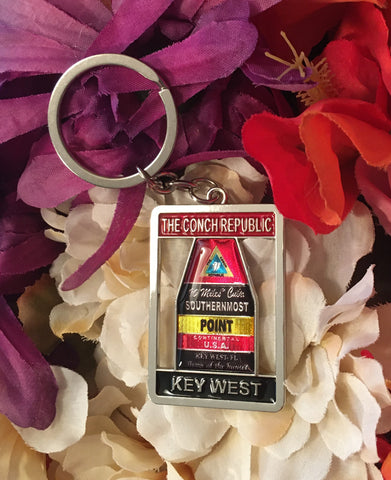 Key Chain showing the Southernmost Point framed with "The Conch Republic"  and "Key West".
