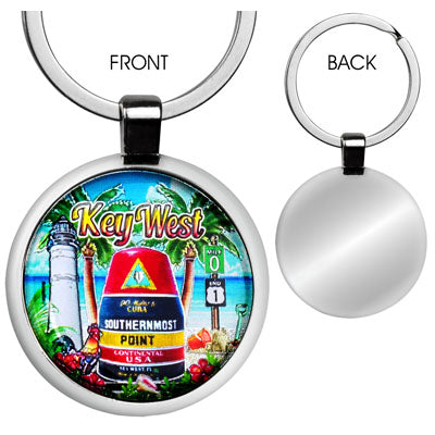 Front and back view of the key chain. Front vew design shows a beachside scenery with the Southernmost Point, Key West lighthouse, Mile 0 US 1 sign, palm trees, flowers, a rooster and "Key West". Back view is a plain shinny grey.