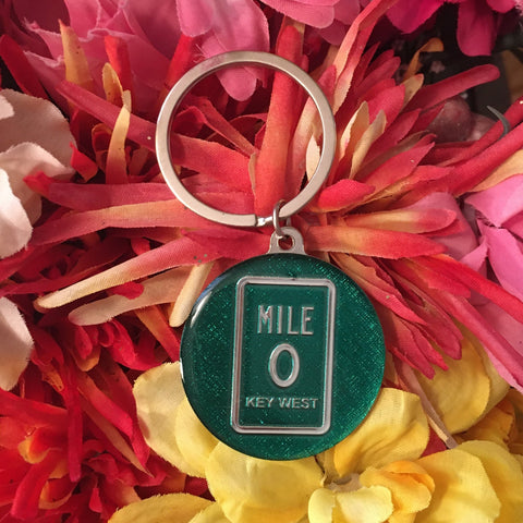 Key Chain showing a round Mile 0 design.