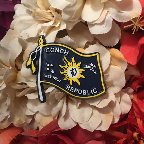 Magnet in the shape of a flag; the Conch Republic flag with "Key West" and "1828".