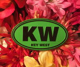 Magnet in oval shape with "KW" and "Key West". Green and black.