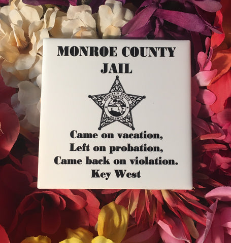 Ceramic Tile 4.25" x 4.25" showing the Monroe County Sheriff's Office Logo in the center, "MONROE COUNTY JAIL" written above and "Came on vacation, Left on probation, Came back on violation. Key West" underneath.