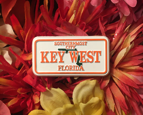 Magnet in the shape of a license plate with the Florida State in the background, "Southernmost City", "Key West" and "Florida".