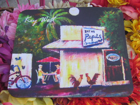 Rectangular mouse pad showing the painting of a couple seating outdoors at Pepe's with two roosters standing by the restaurant's door.