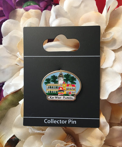 Pin on display card "Collector Pin" showing the Southernmost Point, the Hemingway House, the Southernmost House, the Key West Lighthouse, palm trees and the words "Key West - Florida".