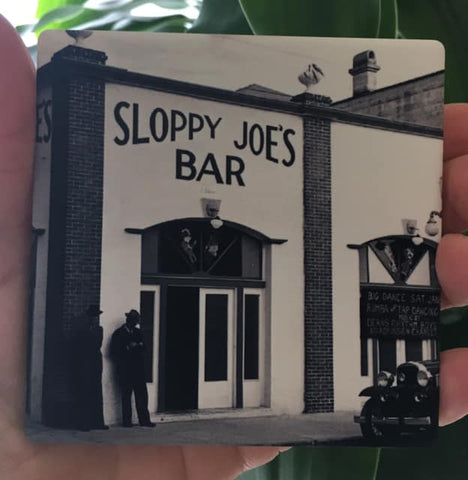 Sandstone Coaster showing a mid 20th century picture of Sloppy Joe's Bar and the mug handle.