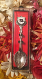 Souvenir spoon in its box.