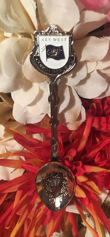 Souvenir spoon showing the Conch Republic flag and "Key West".