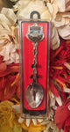 Souvenir spoon in its box.