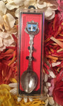 Souvenir spoon in its box.
