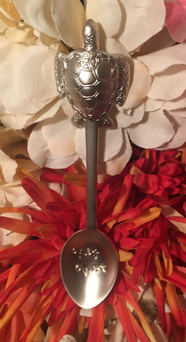 Souvenir spoon whose top is shaped like a sea turtle. With "Key West".