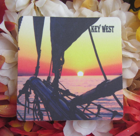 Rubber Coaster showing a beautiful sunset picture taken at the bow of a sailboat.