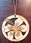 Wood ornament in the shape of an hibiscus flower. With "Key West".