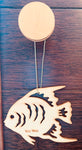 Wood ornament in the shape of a tropical angel fish. With "Key West".