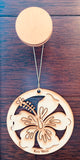 Wood ornament in the shape of an hibiscus flower. With "Key West".