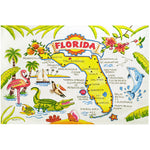 Kitchen towel showing the map of Florida and local attributes: flamingo, alligator, oranges, dolphin, hibiscus, pelican, fish, palm tree, hummingbird, conch shell...