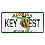 License Plate factory picture showing a Florida style license plate with the State picture in the background partly covered by an orange, the writting "KEY WEST" (big green letters in the middle), "FLORIDA" (smaller capital orange letters on top) and "SUNSHINE STATE" (green capital letters at the bottom).