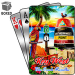Picture showing the design of the Playing cards: beach scenery with the Southernmost Point, a rooster, a parrot, the Mile 0 sign, the End US 1 sign, palm trees, hibiscus, "Key West" and "The Conch Republic".